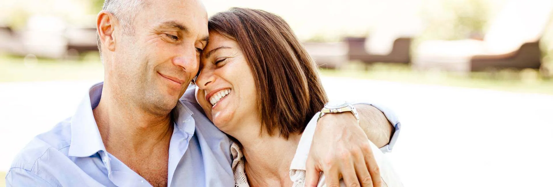 couple hugging and smiling