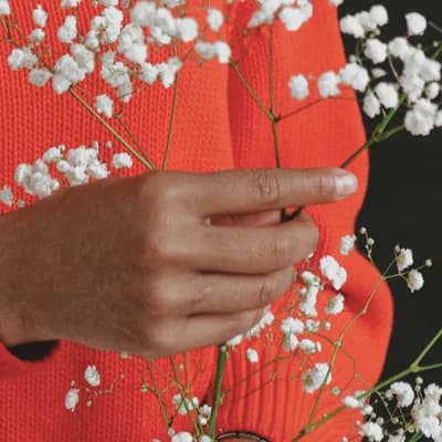 hand hold a flower