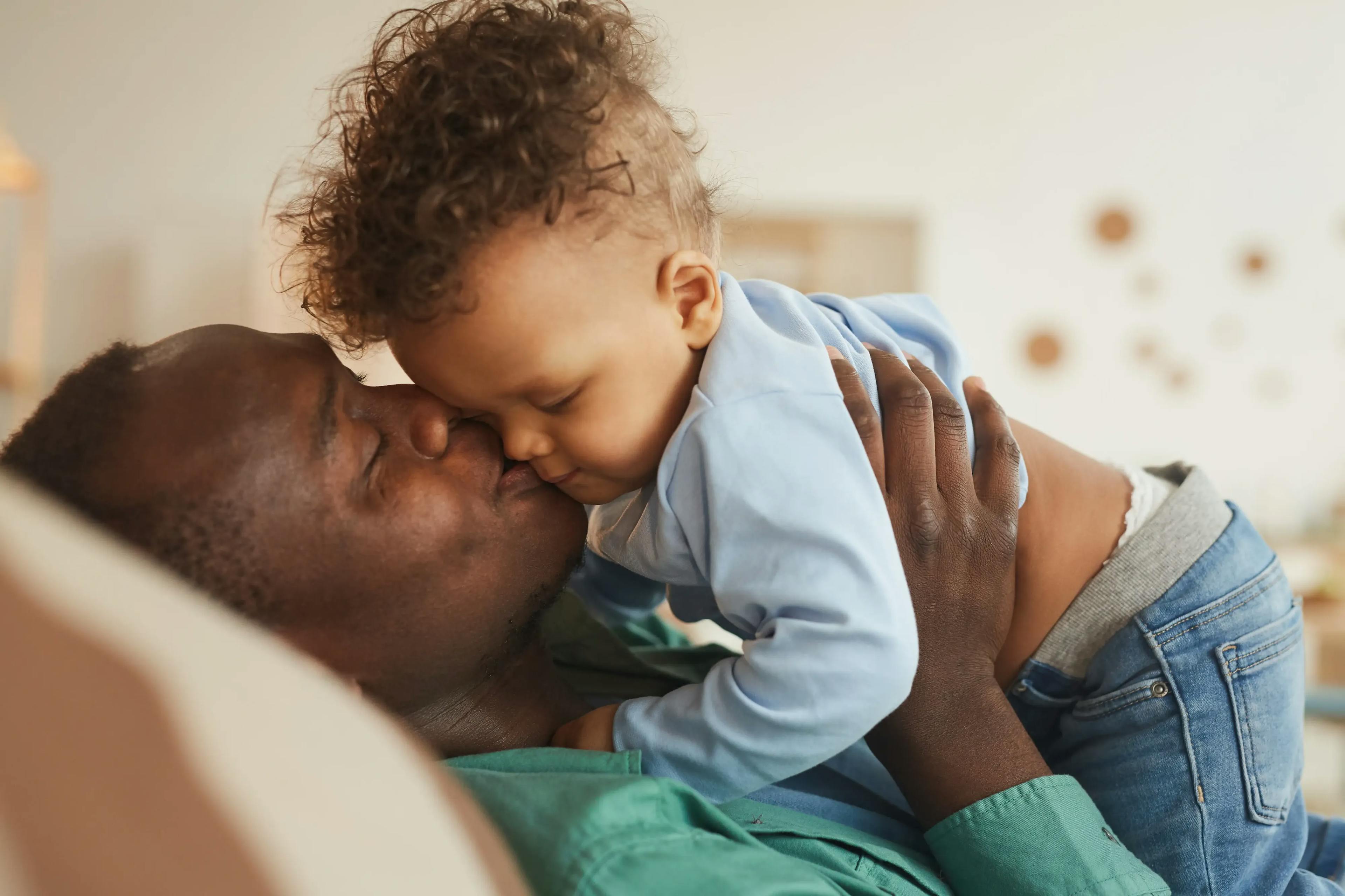 Father and son playing